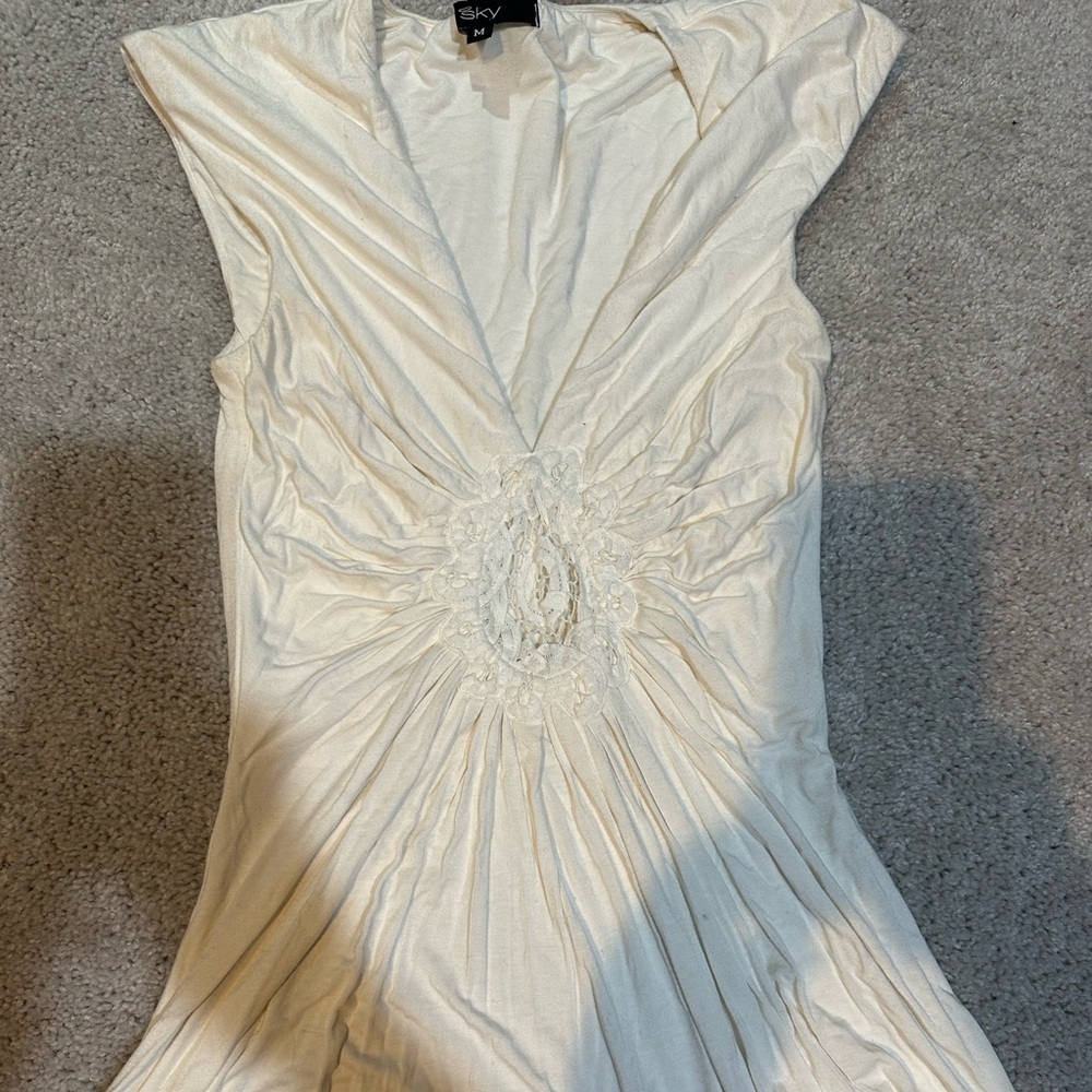 Sky brand flowy top with embellishments on the front